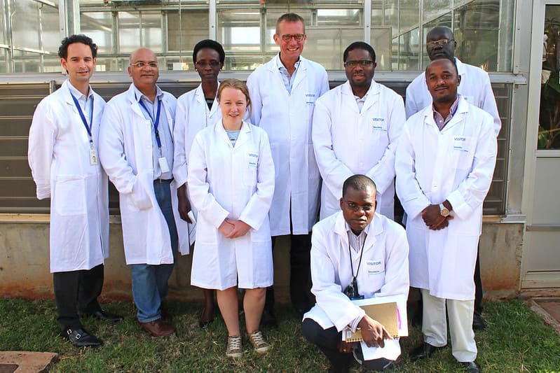 Team reviewing research findings together in a laboratory